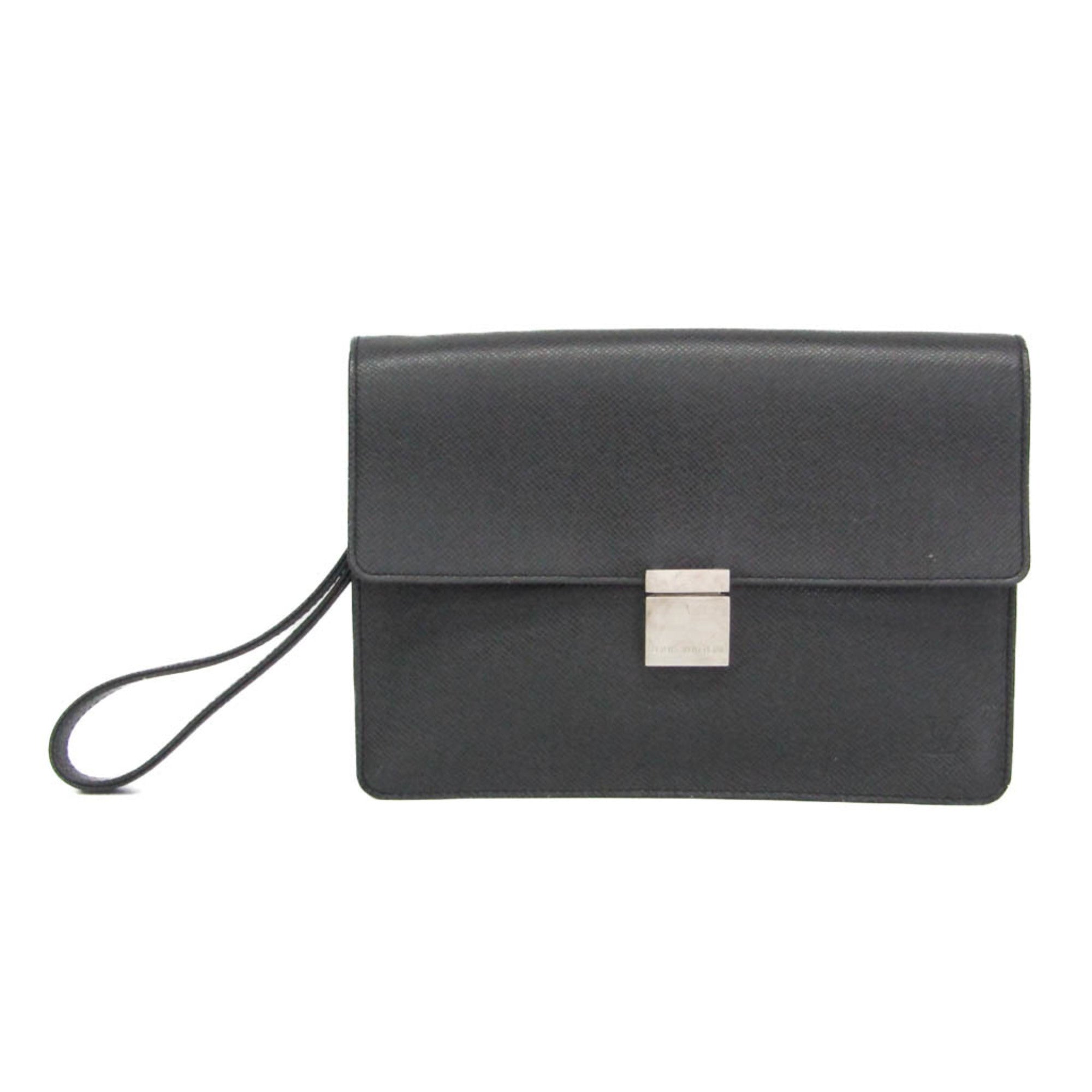 Louis Vuitton Taiga Selenga · Clutch