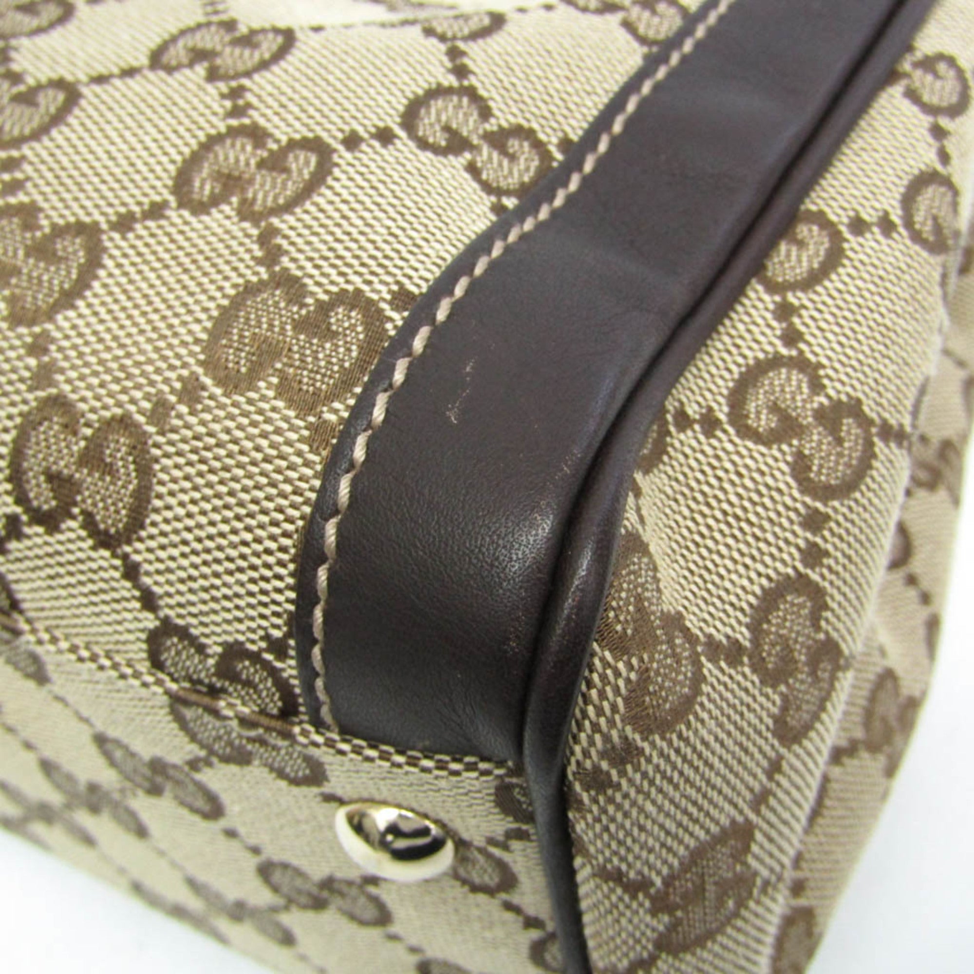 Gucci GG Canvas · Leather Handbag