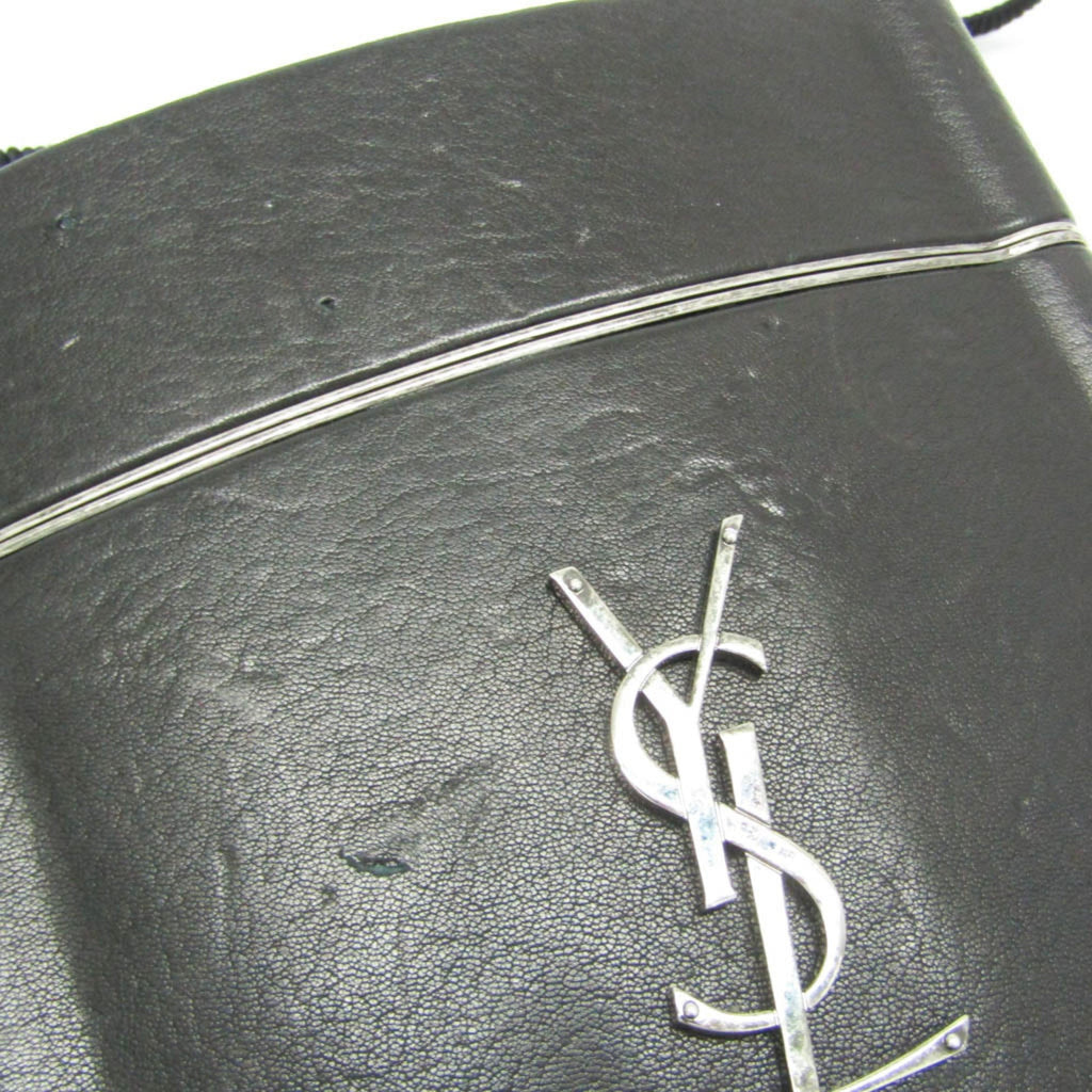 Yves Saint Laurent Opium · Leather