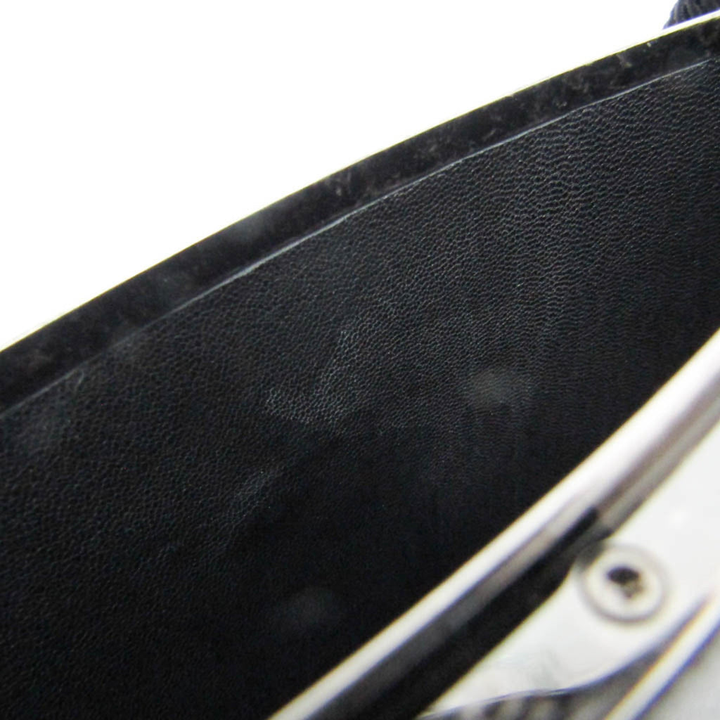 Yves Saint Laurent Opium · Leather