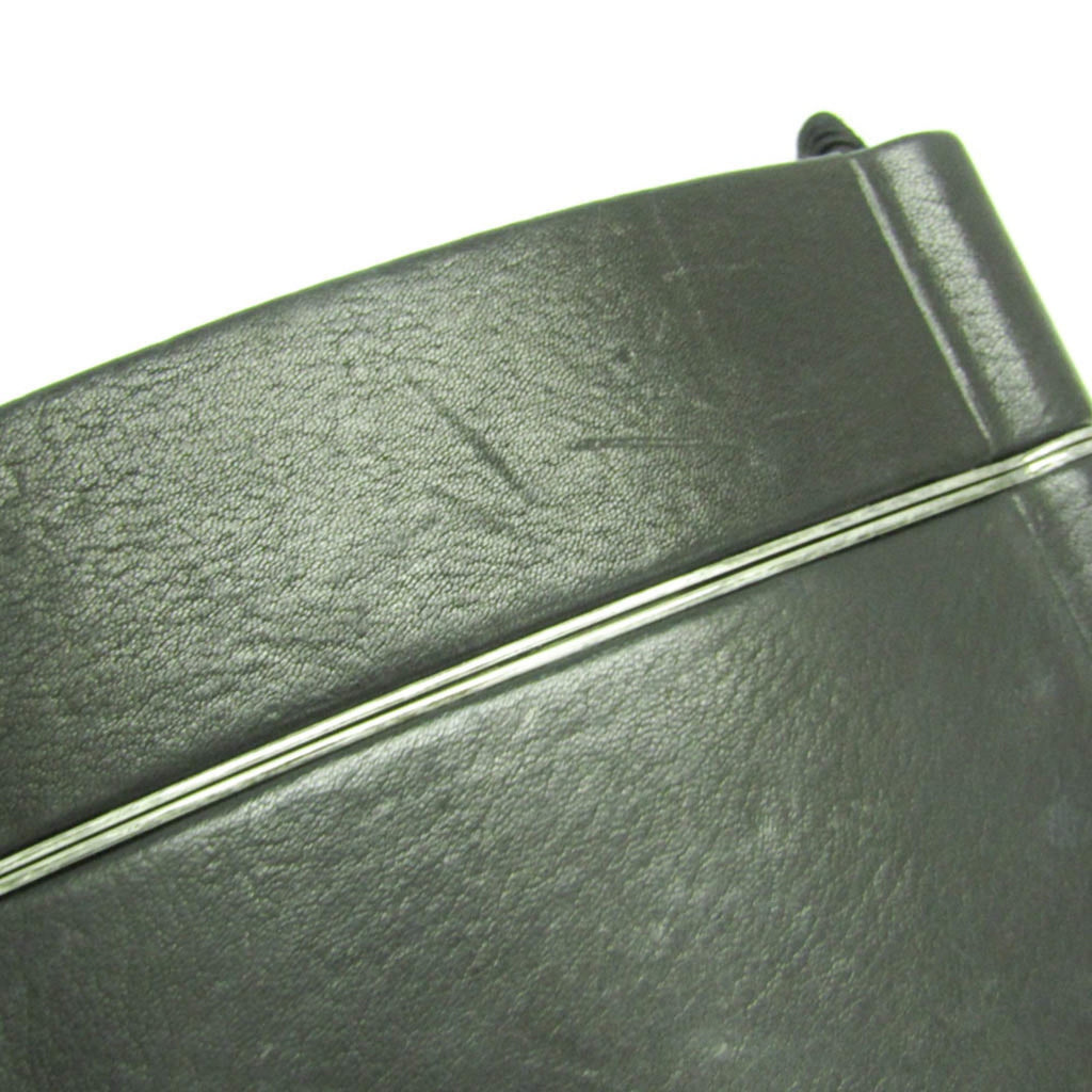 Yves Saint Laurent Opium · Leather