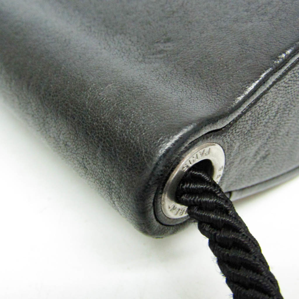Yves Saint Laurent Opium · Leather