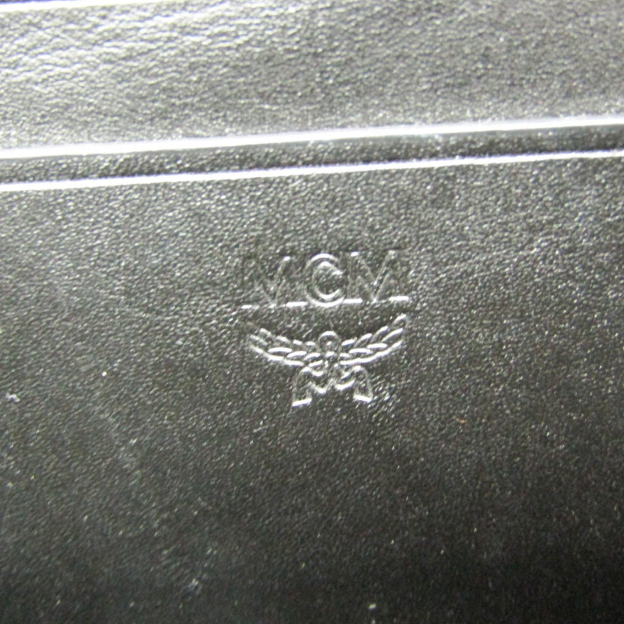 MCM Visetos Triple Body · Coated Canvas