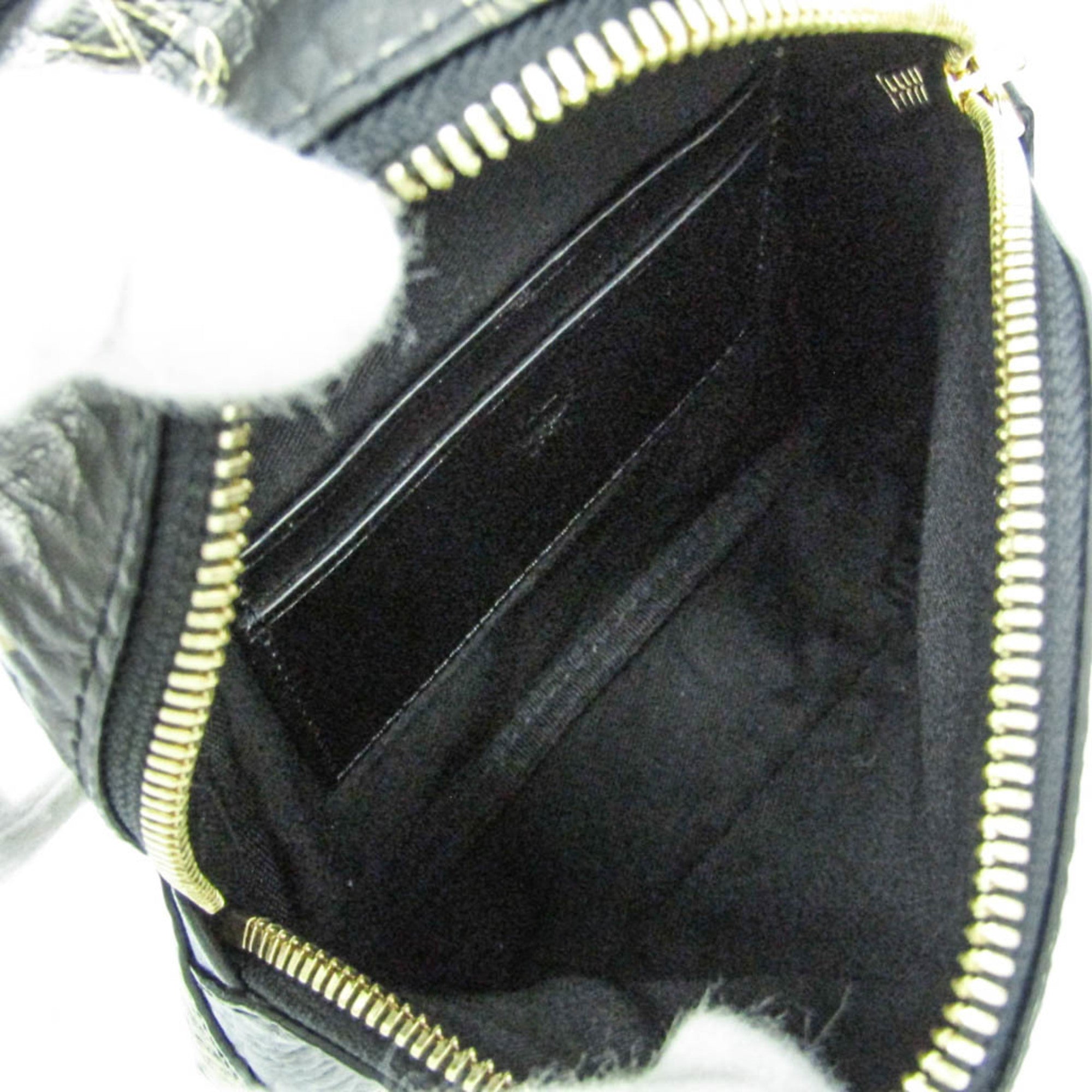 MCM Visetos Triple Body · Coated Canvas