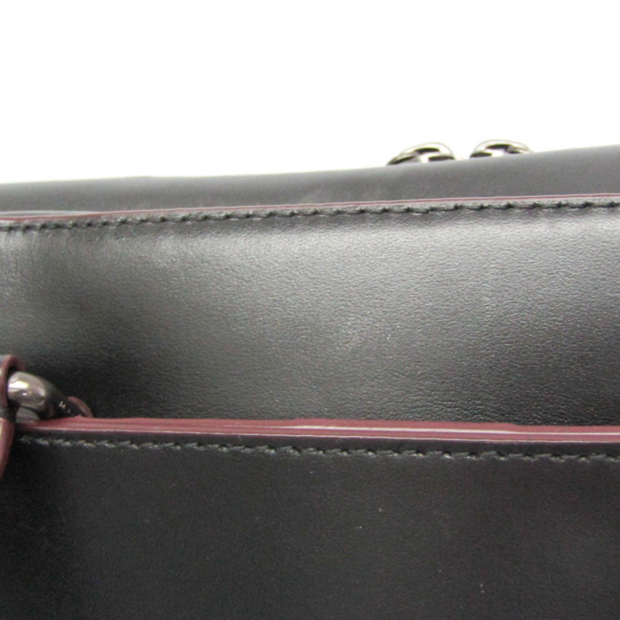 Coach Signature · Briefcase