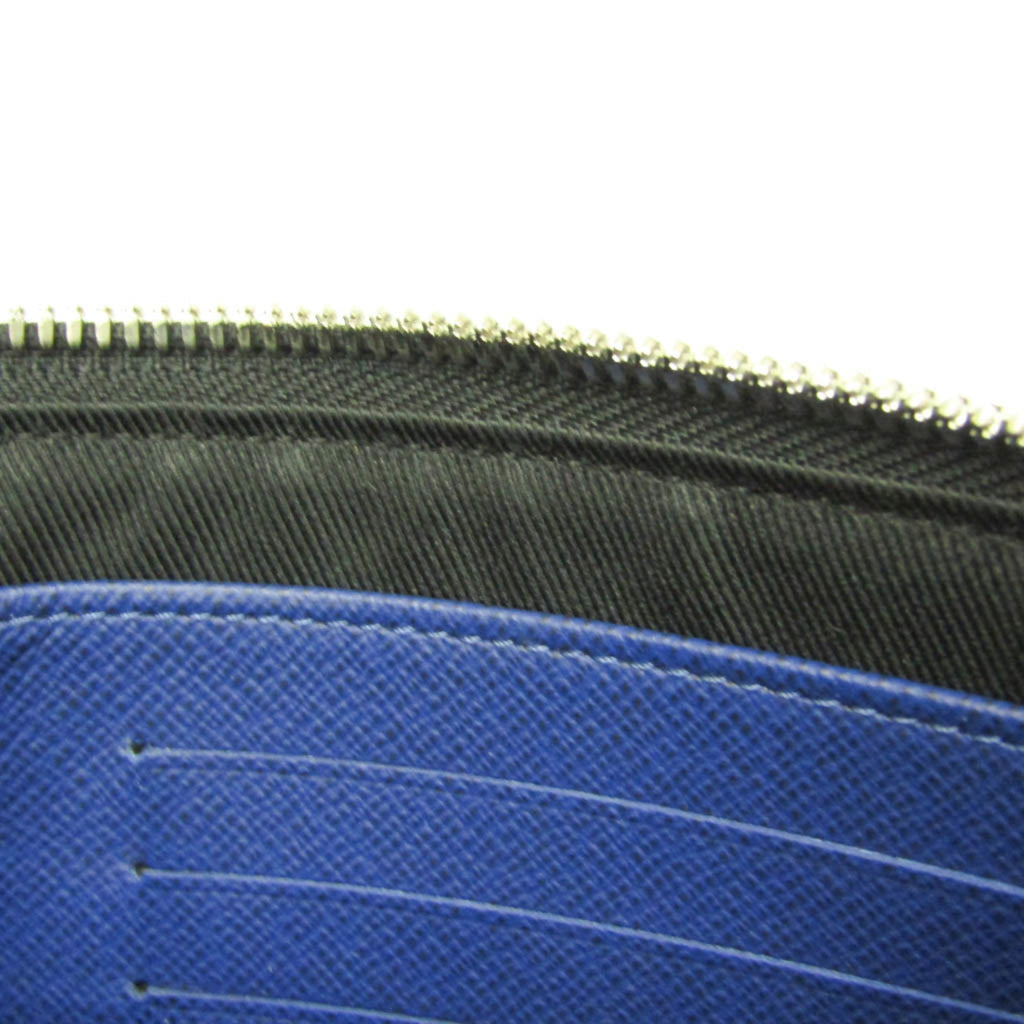 Louis Vuitton Taiga · Pochette Discovery PM