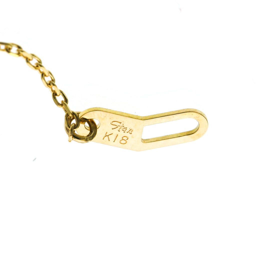 Star Jewelry Cross · 18K Yellow Gold · Diamond