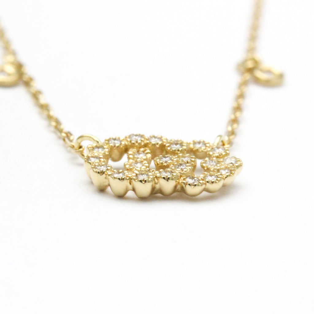Gucci GG Logo · Diamond · 18K Yellow Gold