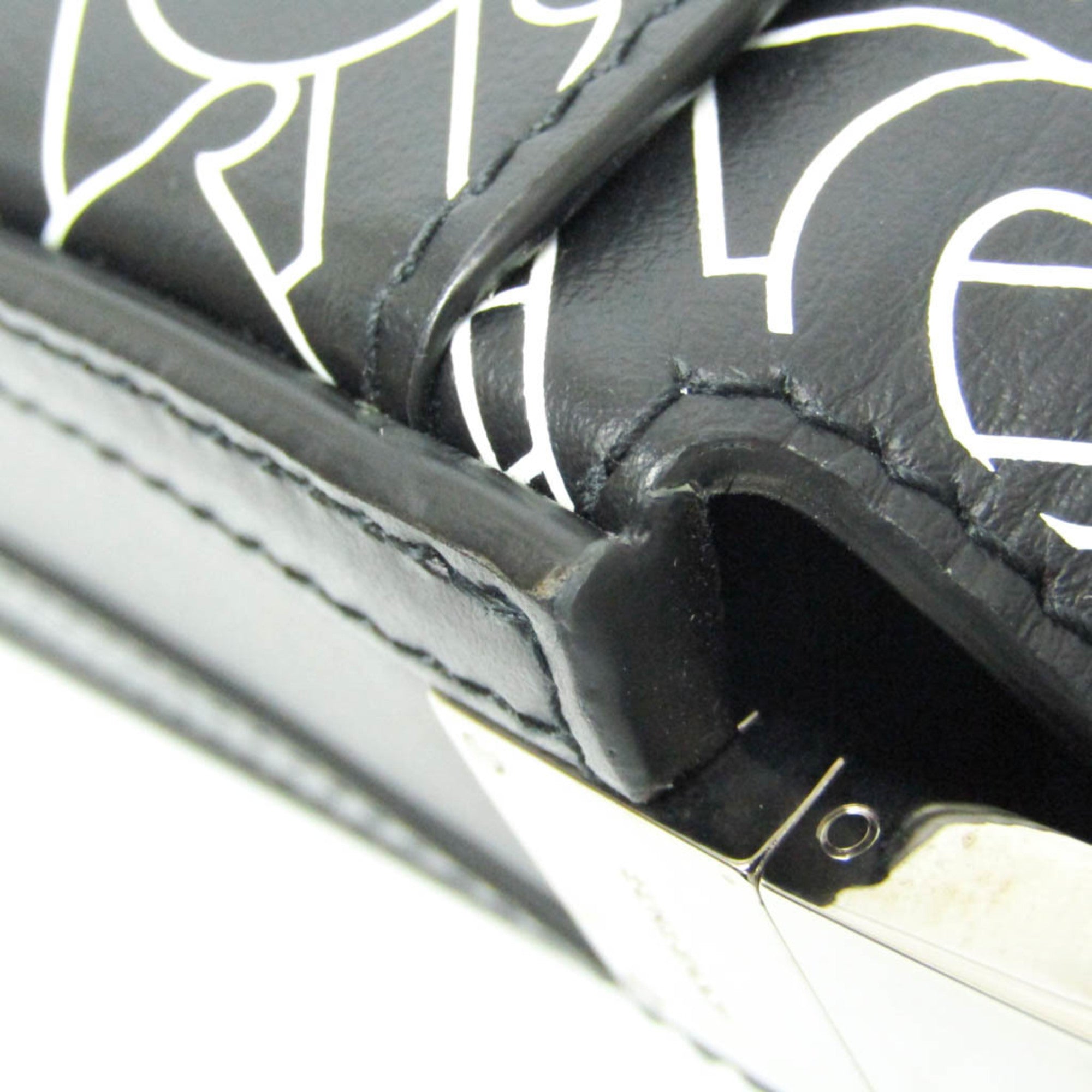 Burberry TB Monogram · Leather