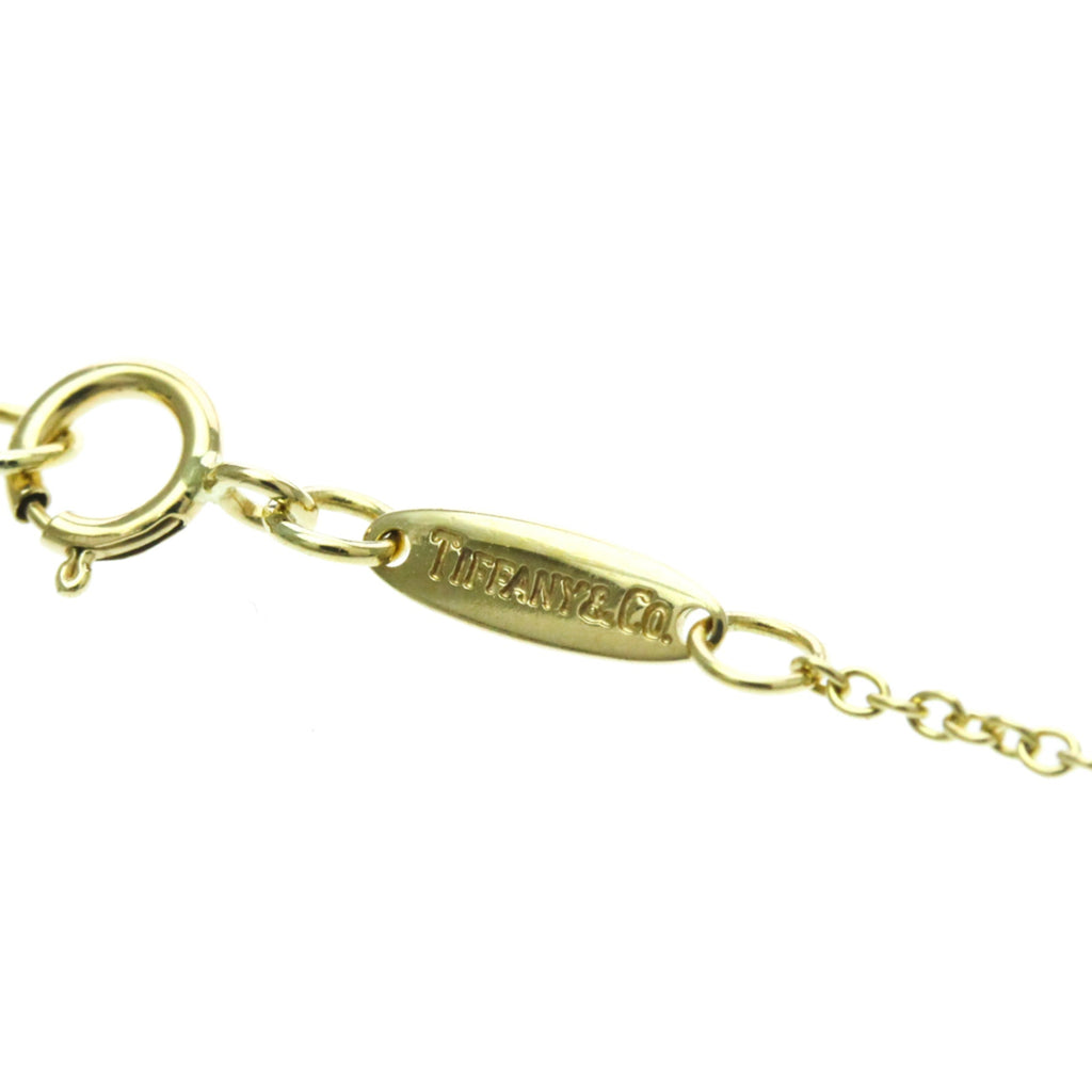 Tiffany Seviana · 18K Yellow Gold
