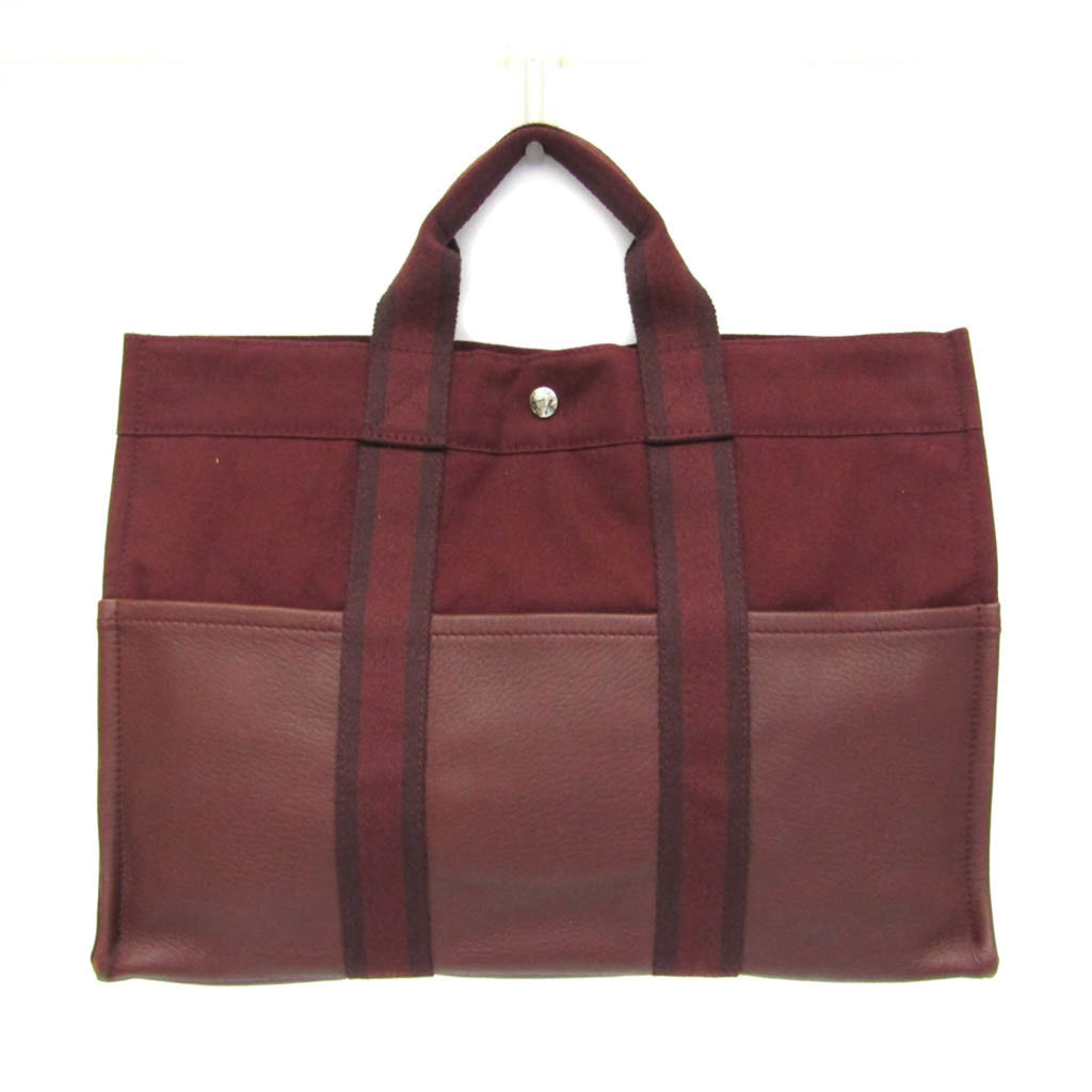 Hermès Fourre Tout MM · Canvas & Leather