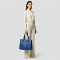 Gucci GG Embossed Tote · Leather