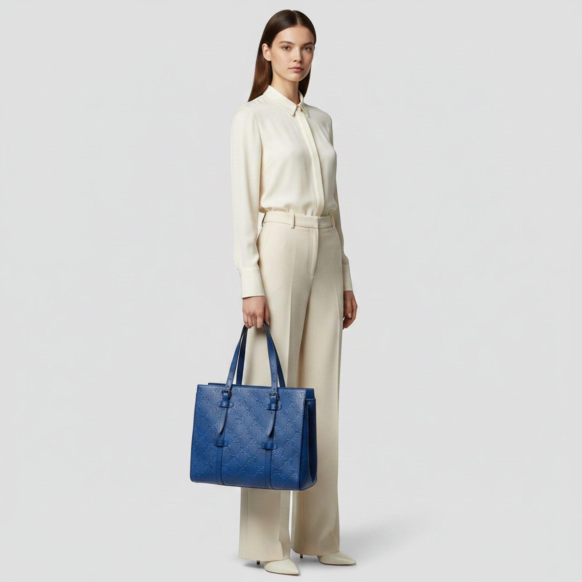Gucci GG Embossed Tote · Leather
