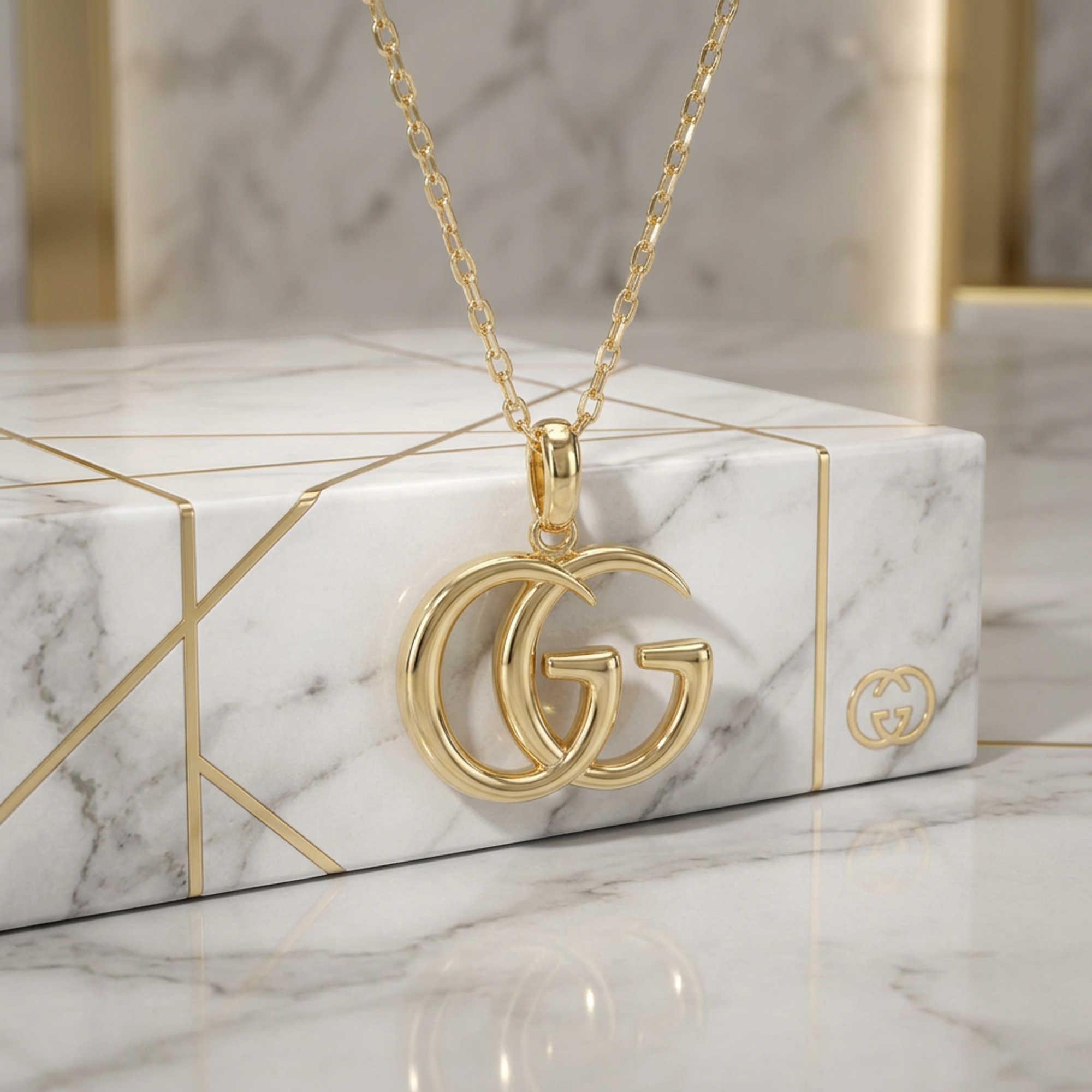 Gucci Double GG · 18K Yellow Gold