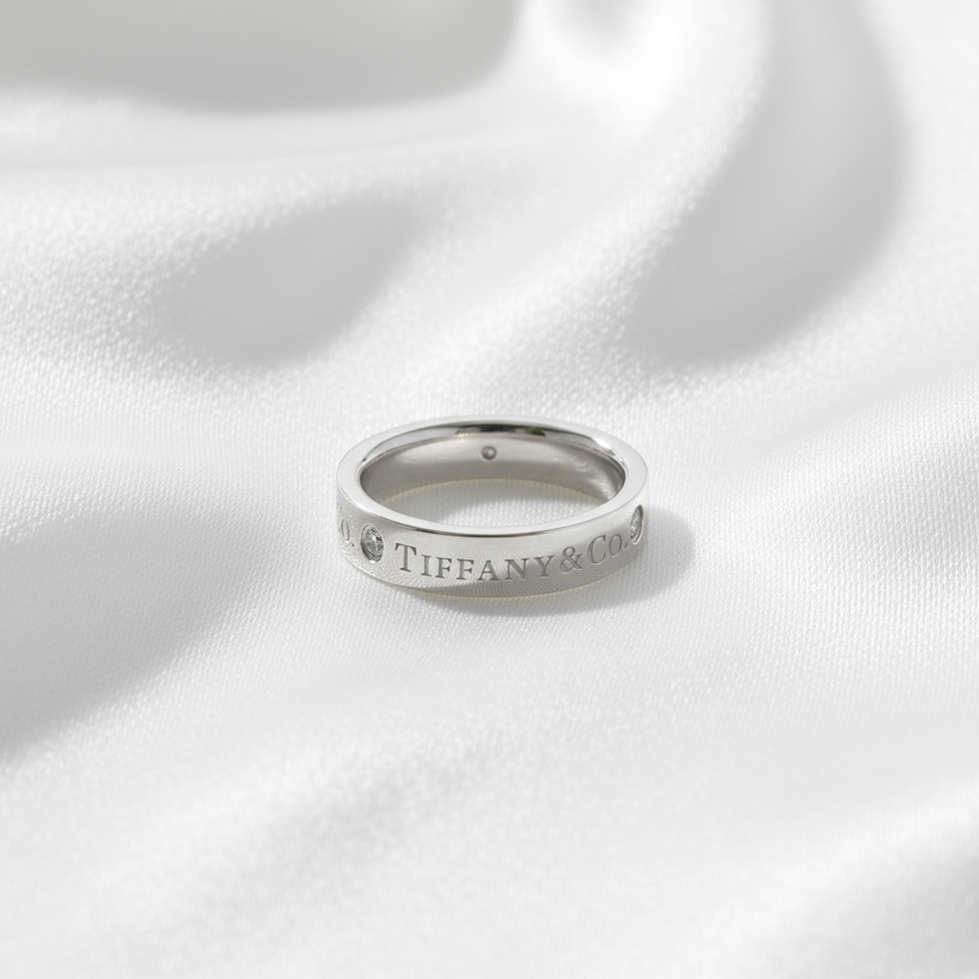 Tiffany Platinum Band · Three Diamonds