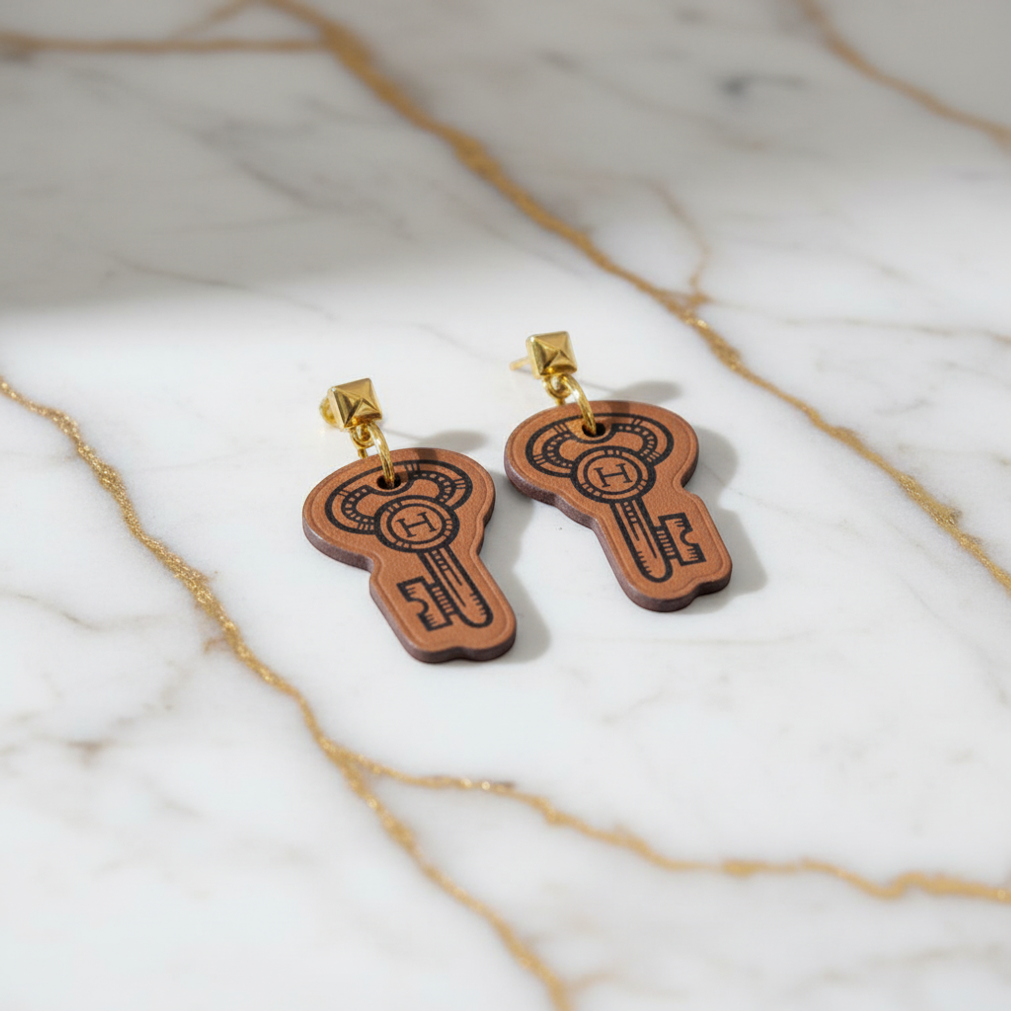 Hermès H Curiosité · Leather Drop Earrings
