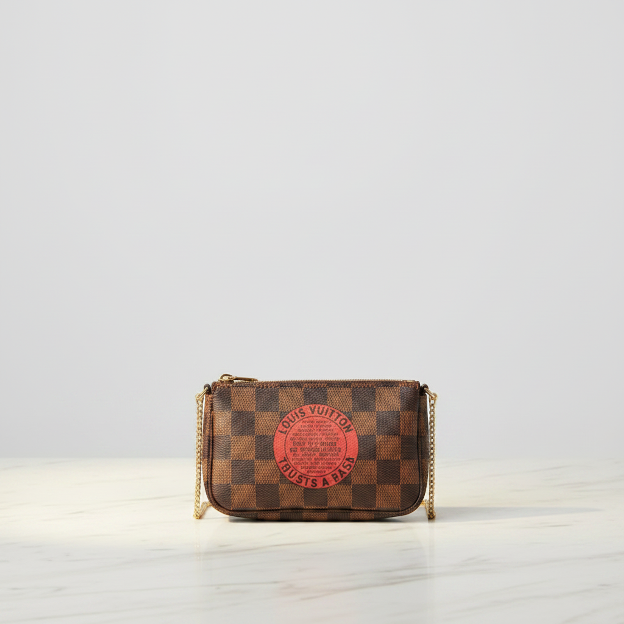 Louis Vuitton Damier Ebene · Mini Pochette