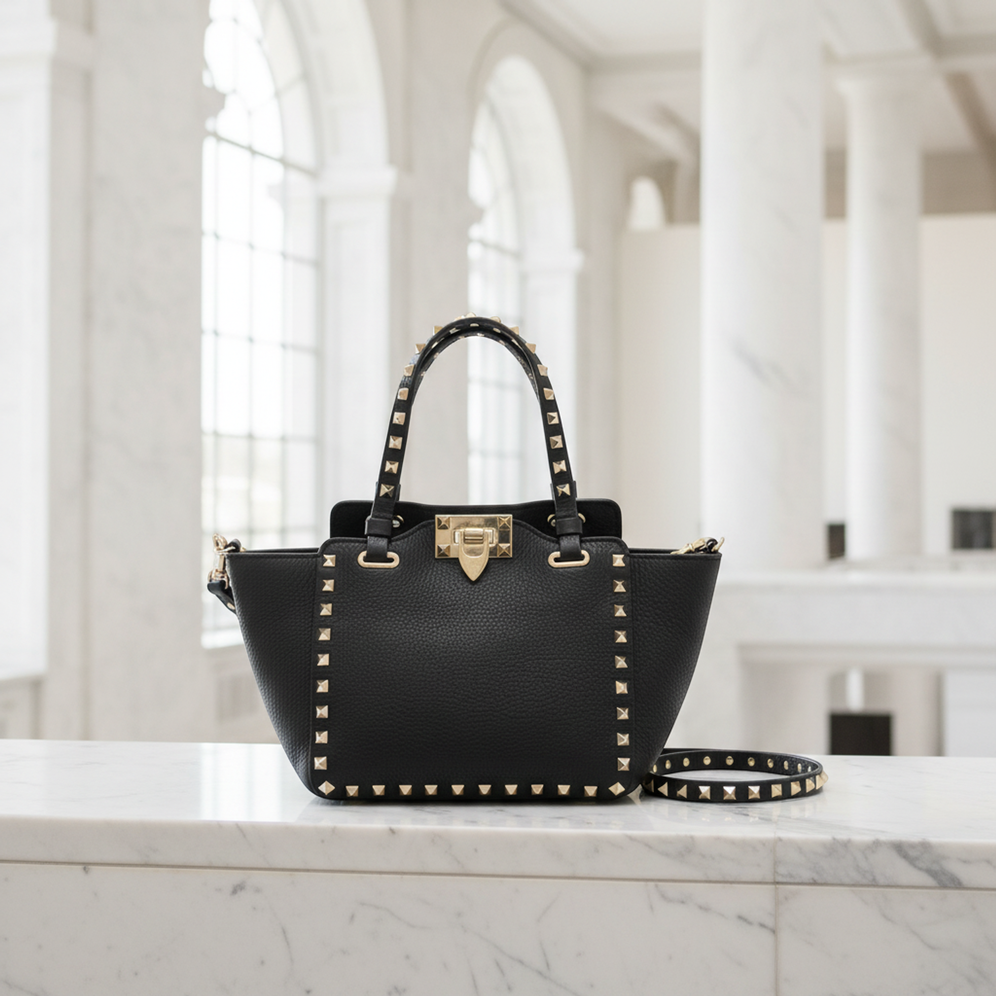 Valentino Garavani Lock Studs · Leather