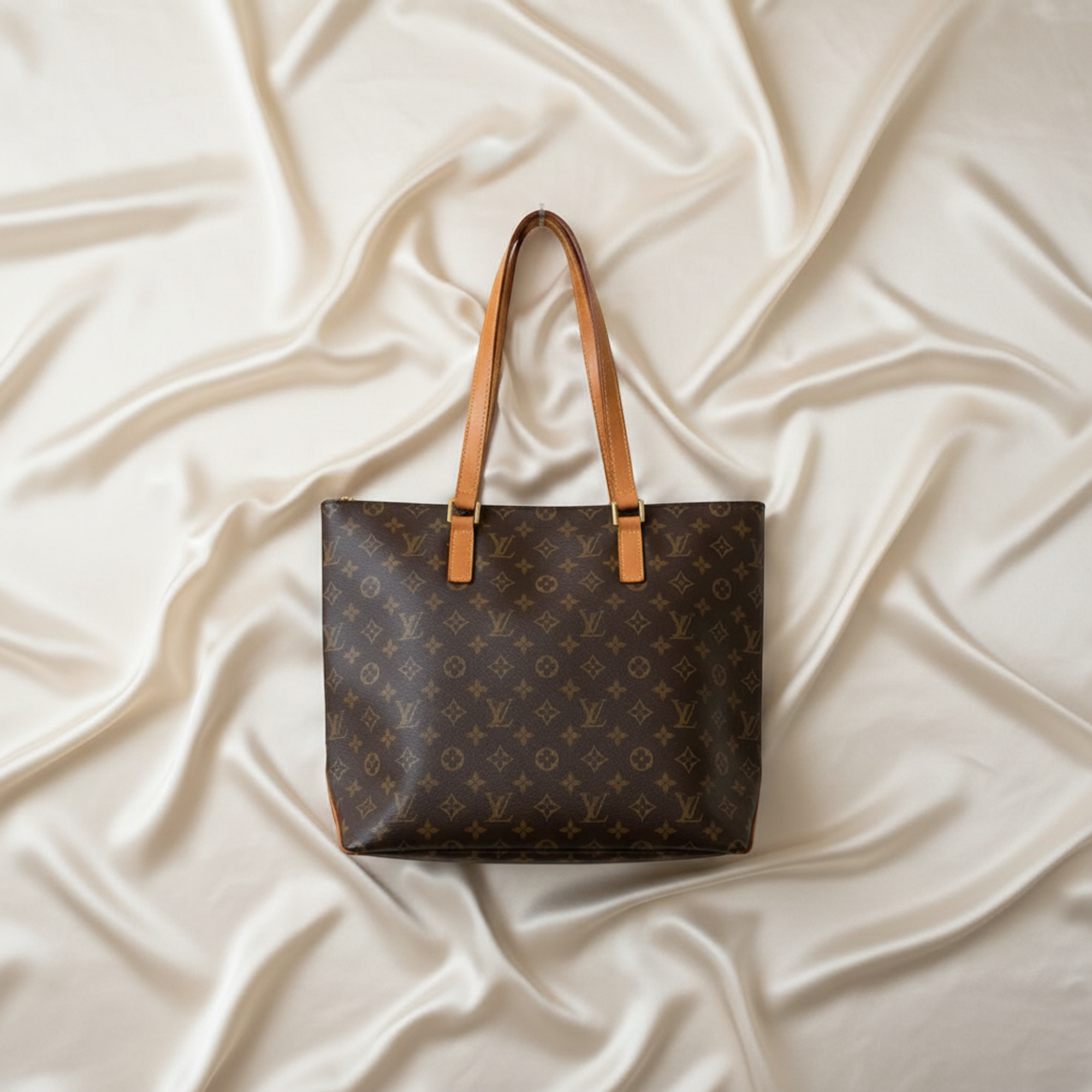 Louis Vuitton Kabamezo · Monogram